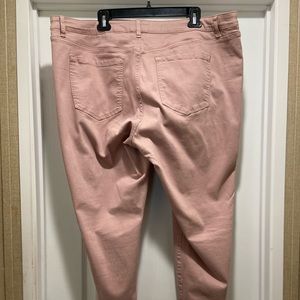 Blush pink colored skinny jeans